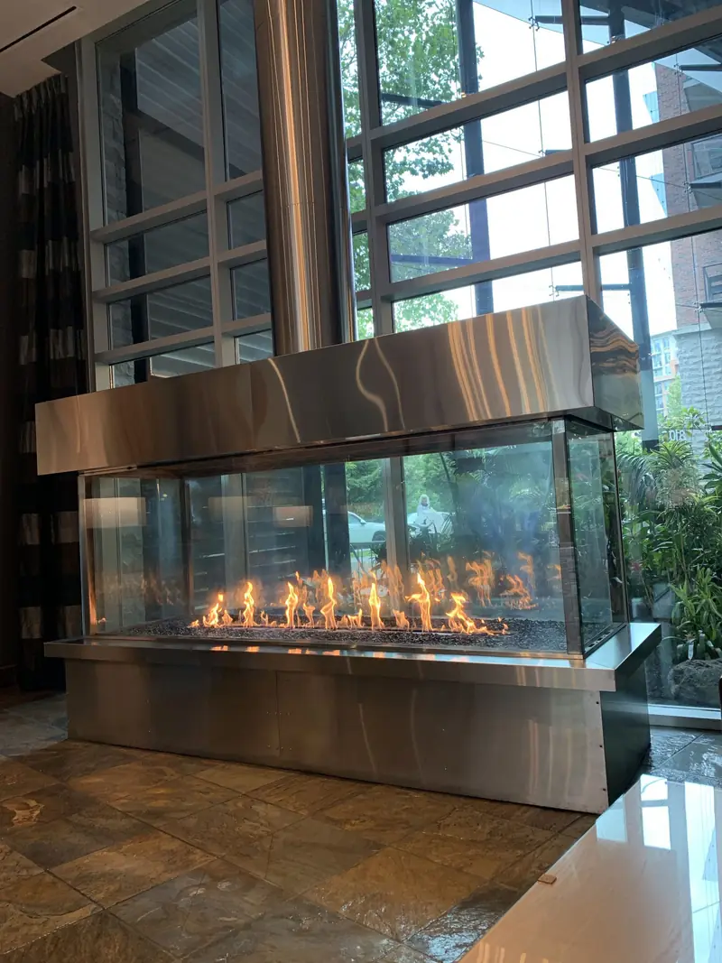 The glass fireplace in the hotel lobby lounge